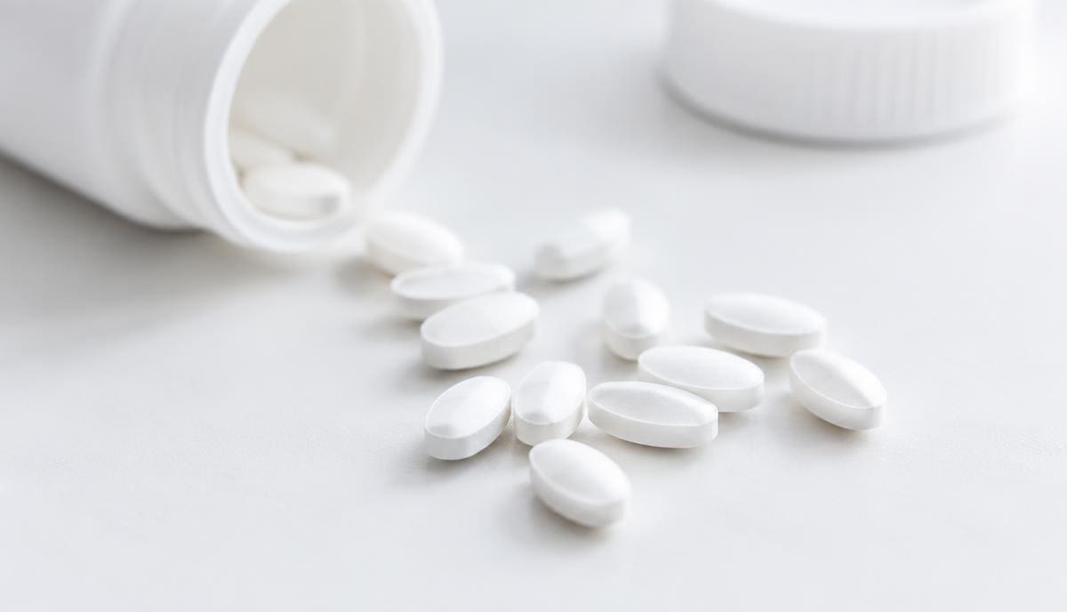 DoseRoutine Levocetirizine Levocetirizine film-coated tablets on a matte clinical surface